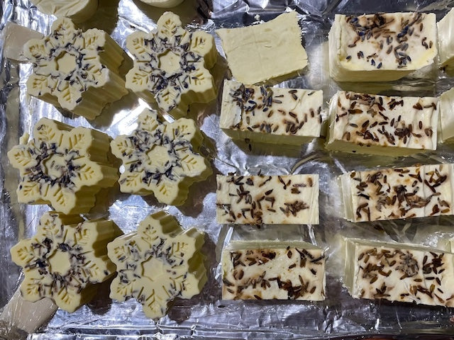 Handmade botanical soap bars created during a Face to Grace soap making workshop